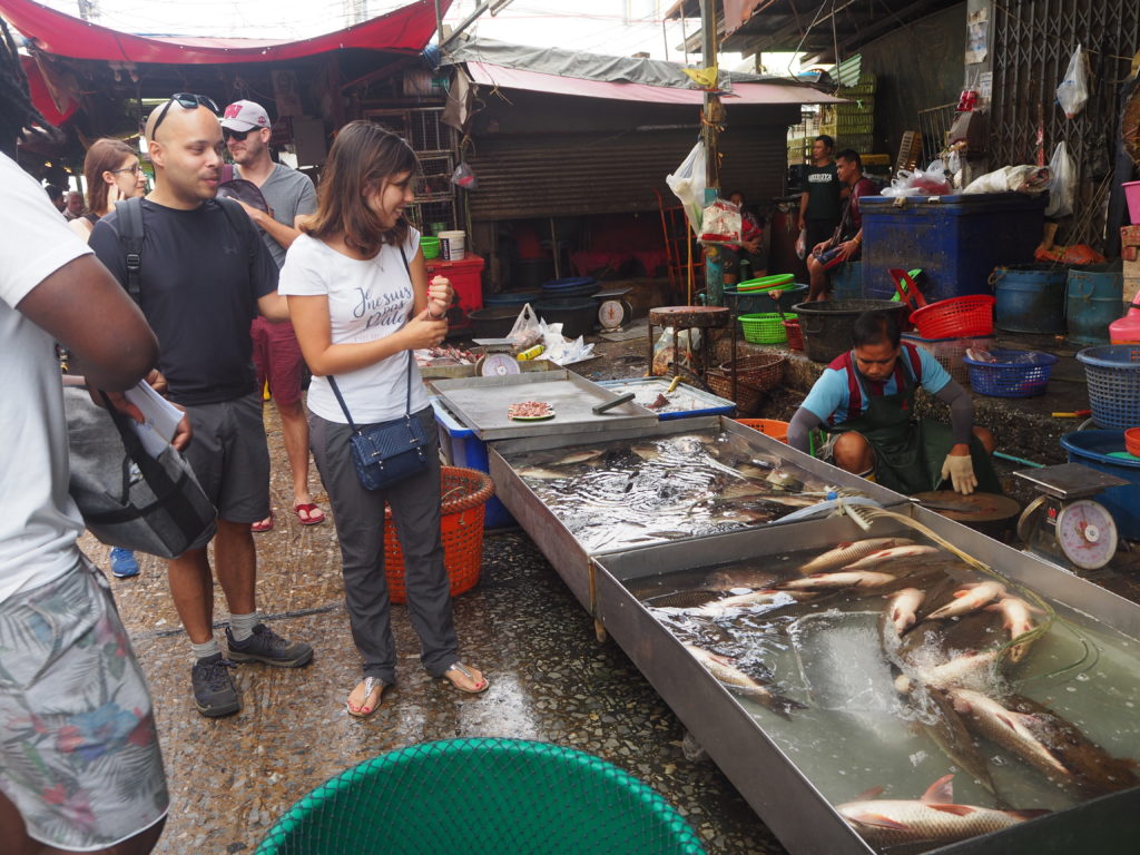 Khlong Toei Market woth fishes and tourists